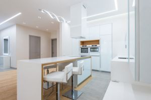 Because of its strength, beauty, and ease of maintenance, quartz has become a popular countertop material in contemporary home offices.