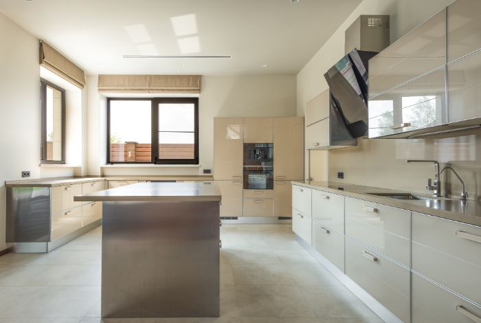 Coordinating countertops with statement floor tiles requires balancing bold patterns with subtle, complementary surfaces.